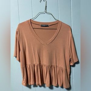 Light orange tee shirt